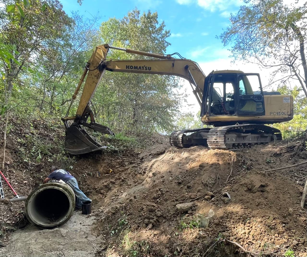 Komatsu excavator land clearing near Decatur IL — Brohez Trucking