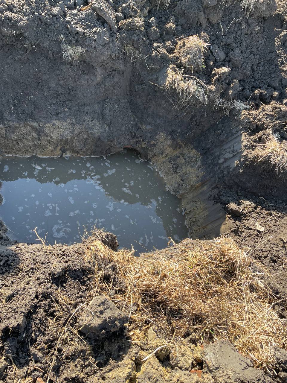 Old failed culvert pipe being removed — Brohez Trucking culvert repair