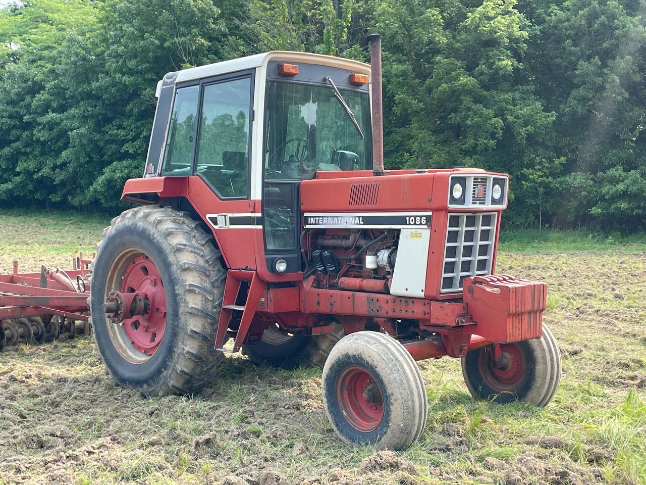 International 1086 tractor used for material handling — Brohez Trucking LLC