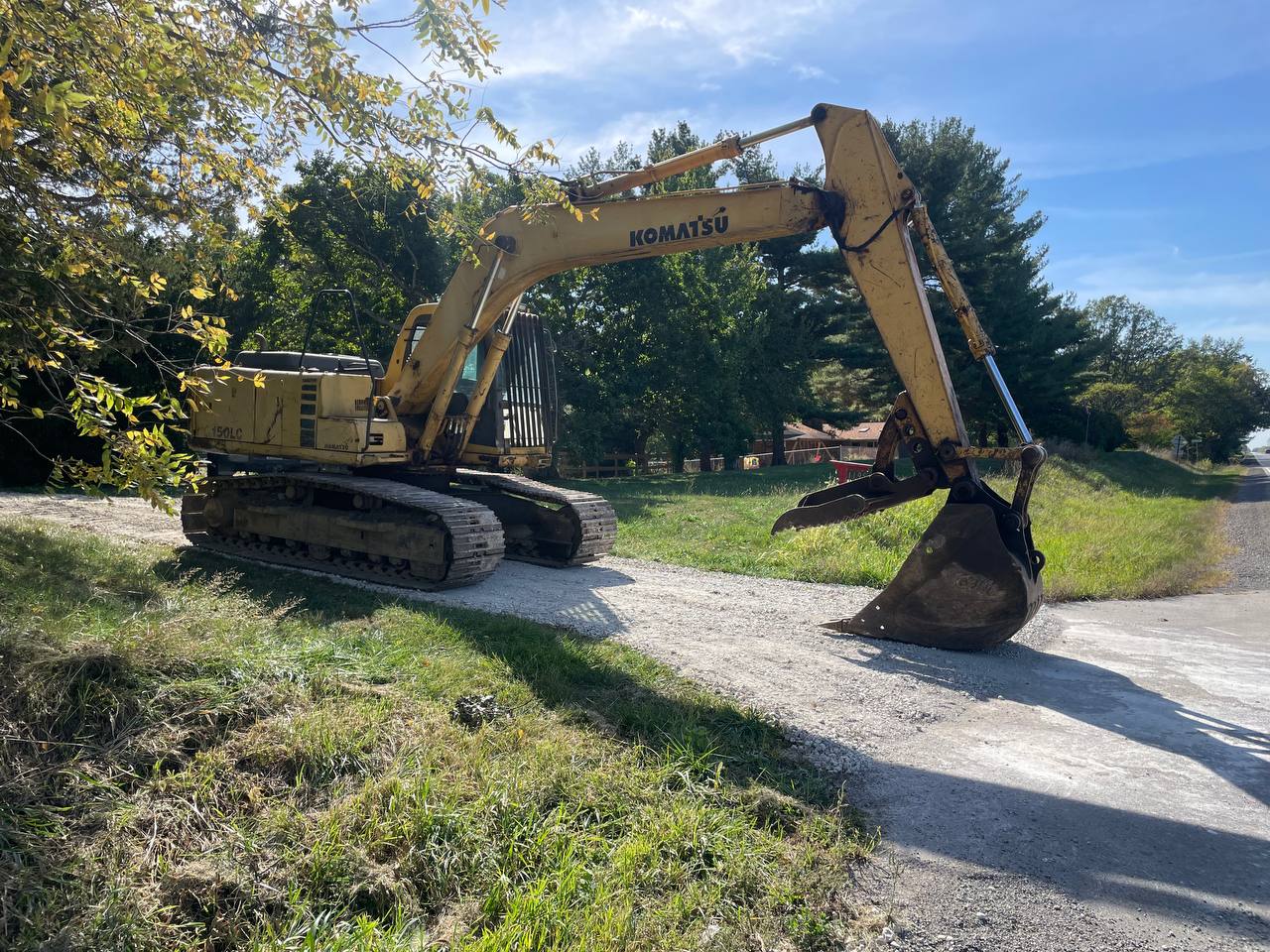 Komatsu PC150LC on long gravel driveway build — Brohez Trucking