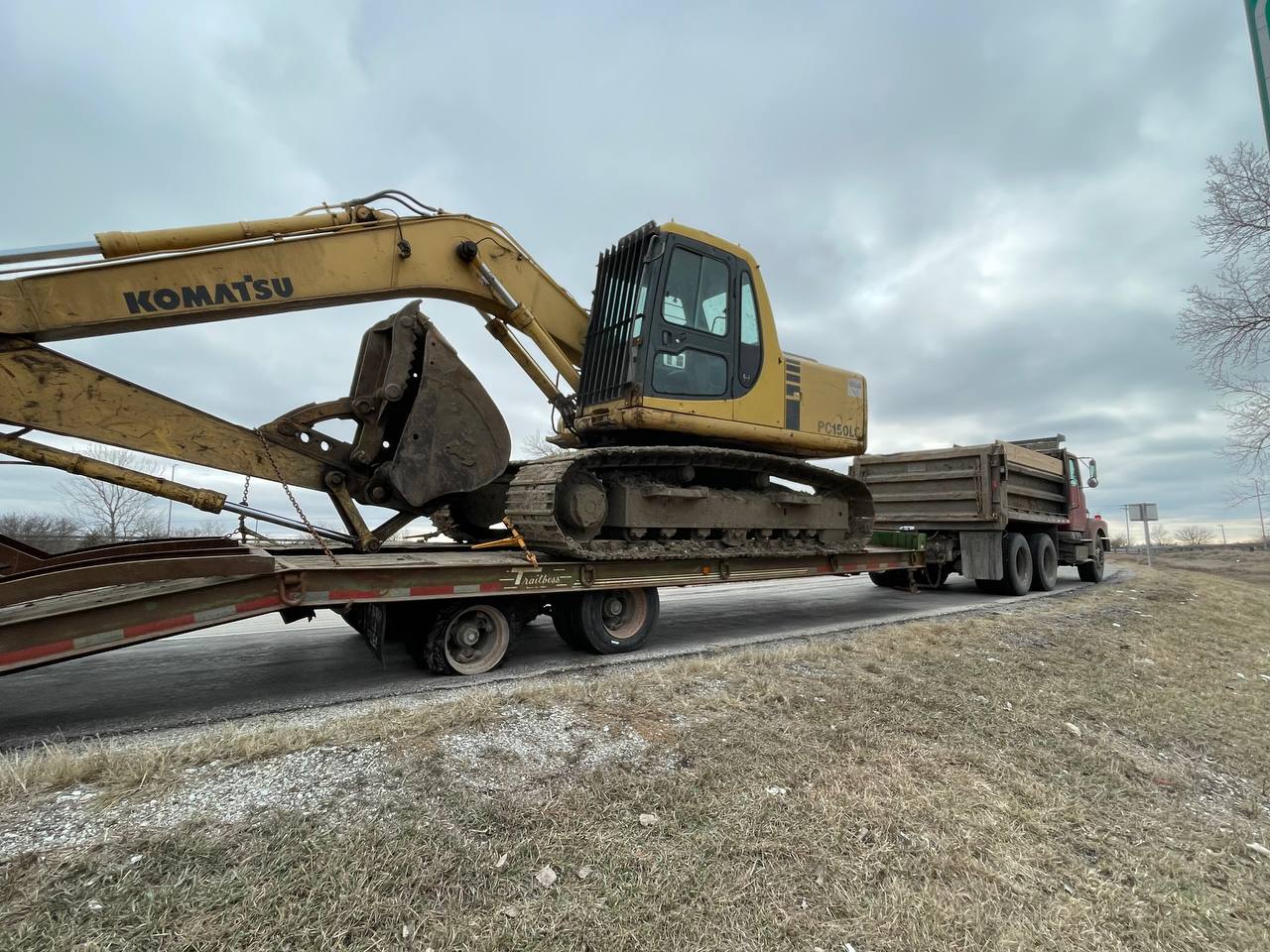 Komatsu excavator transported to job site in Mattoon IL — Brohez Trucking