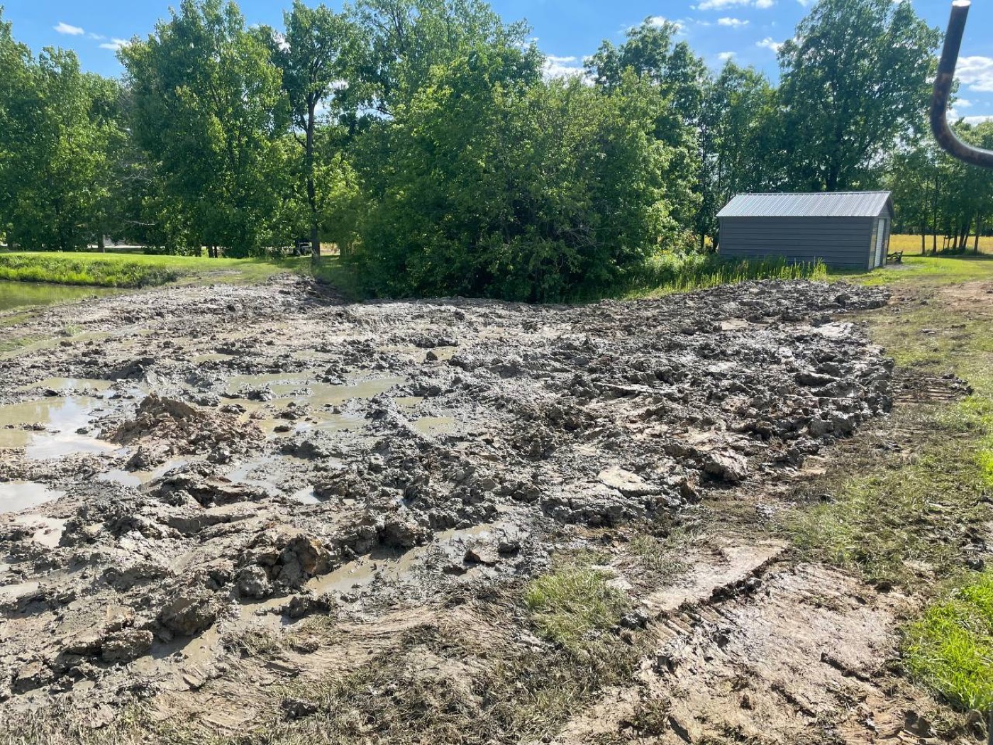 Before — silted, drained farm pond basin in central Illinois ready for cleanout by Brohez Trucking LLC